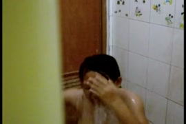 Asian babe sucks and fucks in the shower.